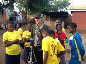 Tsoudis sharing some camera time with orphans. 