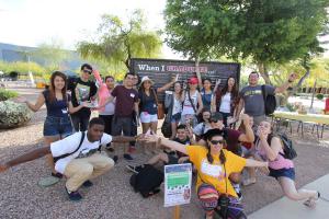 Students complete graduation goals on a wall reading "When I graduate, I will ______" to help inspire them on their academic journeys.